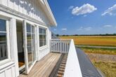 NEUBAU - ERSTBEZUG! Schwedenhaus mit Südbalkon & großem Grundstück in Garlstorf (Bleckede) - Balkon mit wundervoller Aussicht
