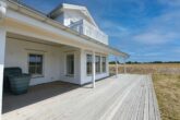 NEUBAU - ERSTBEZUG! Schwedenhaus mit Südbalkon & großem Grundstück in Garlstorf (Bleckede) - Terrasse