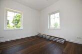 NEUBAU - ERSTBEZUG! Schwedenhaus mit Südbalkon & großem Grundstück in Garlstorf (Bleckede) - EG - Zimmer 1