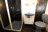 Einfamilienhaus mit zweiter Wohneinheit im Nebengebäude auf großem Grundstück - Haupthaus - EG - Gäste WC